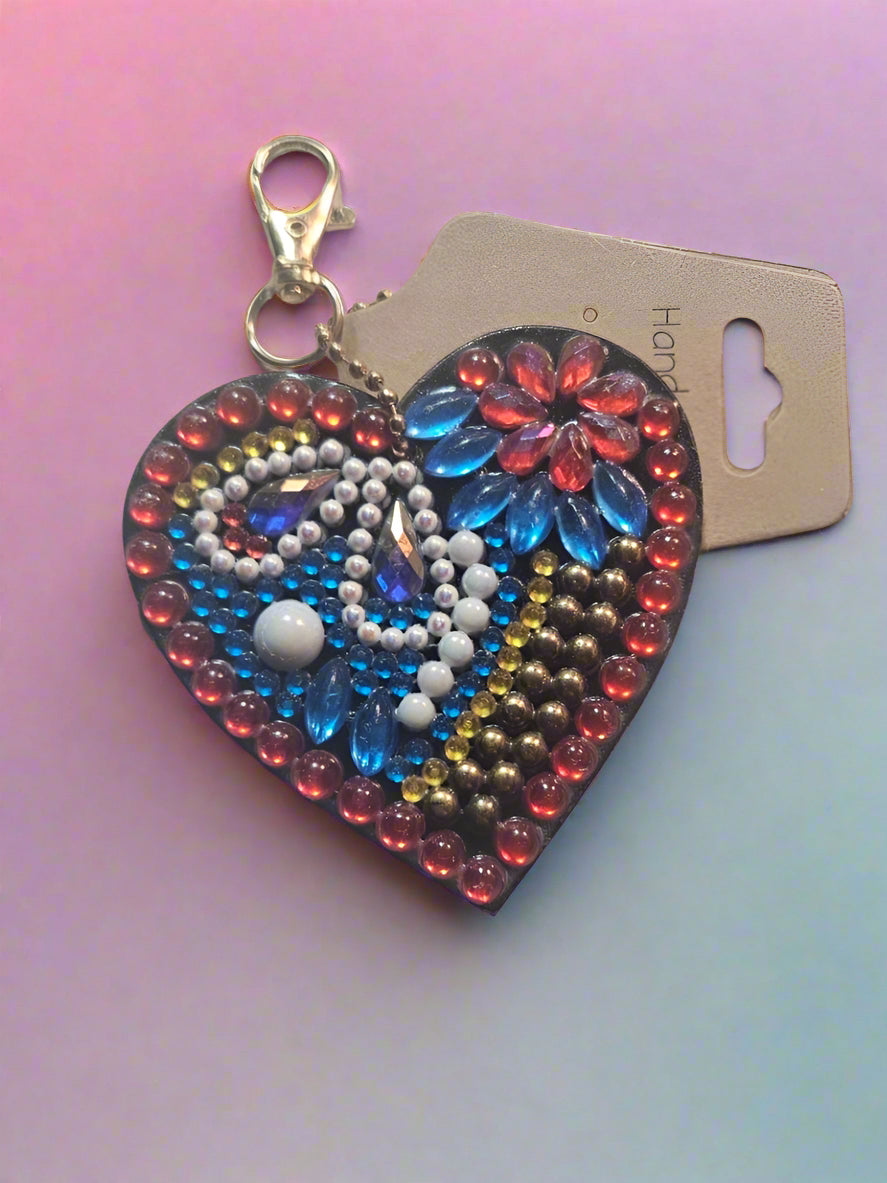 Colorful beaded keychain on a gray surface